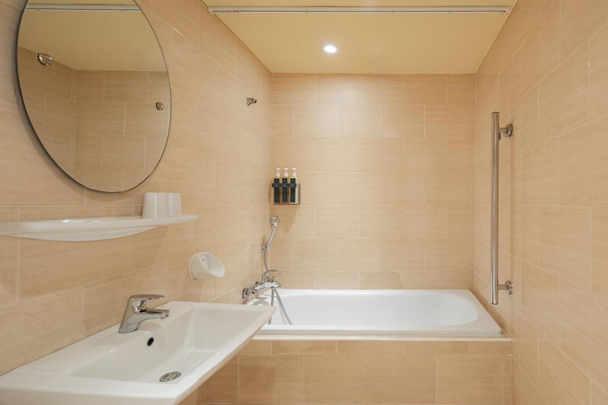 Kindness Hotel Wu-Jia Гаосюн Номер фото