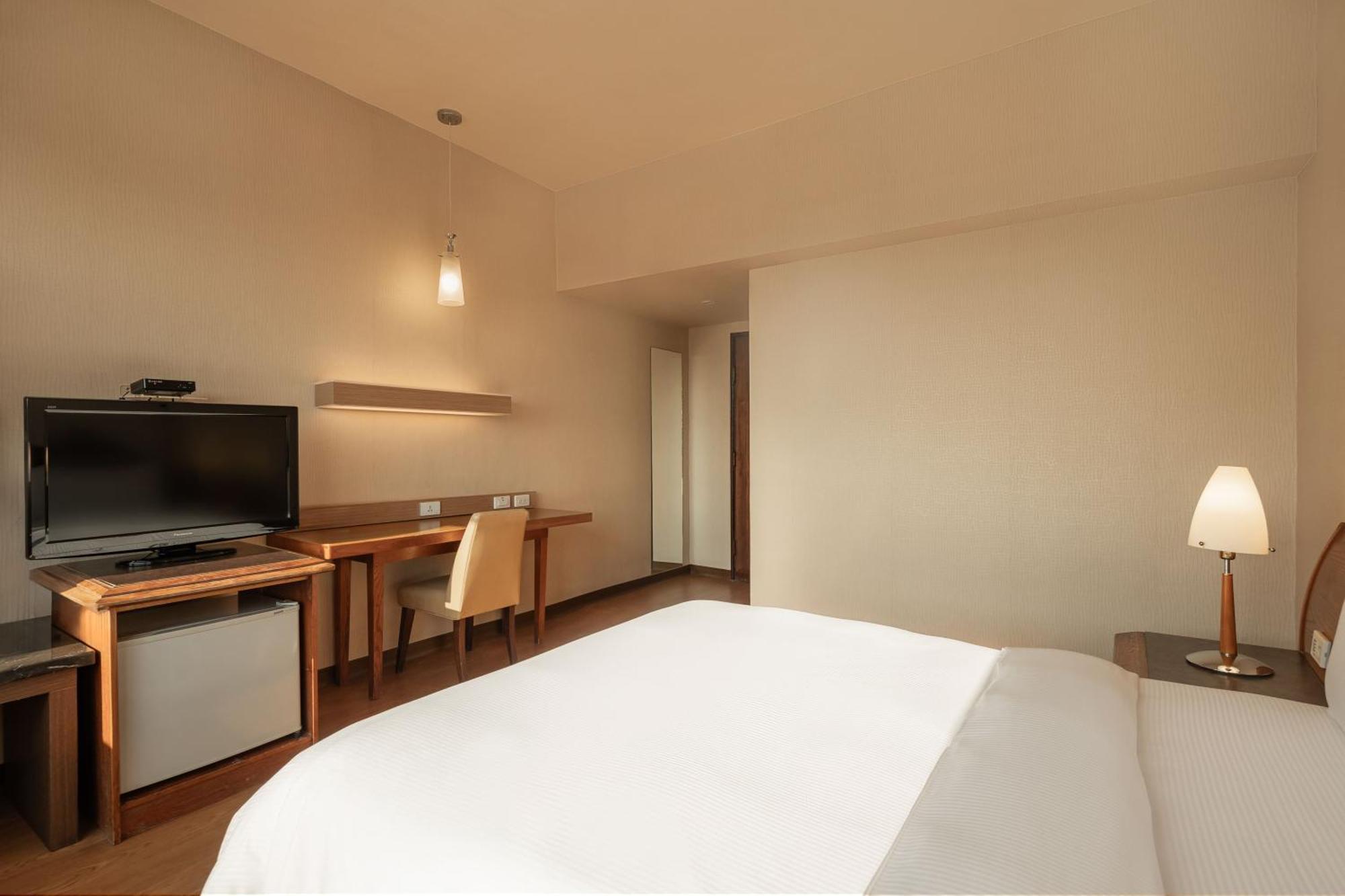 Kindness Hotel Wu-Jia Гаосюн Номер фото