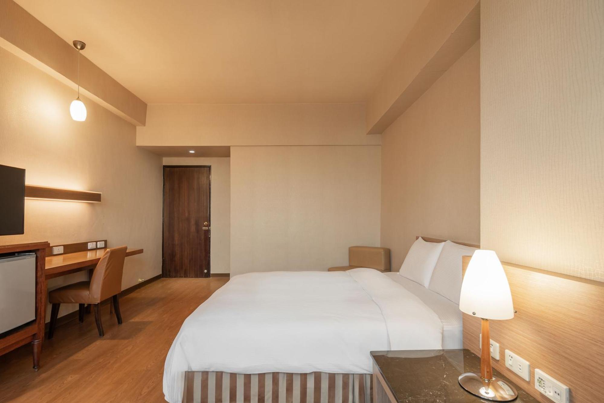 Kindness Hotel Wu-Jia Гаосюн Номер фото