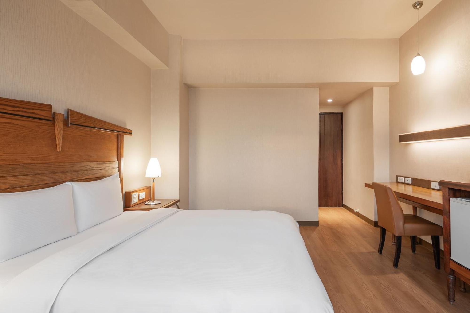 Kindness Hotel Wu-Jia Гаосюн Номер фото